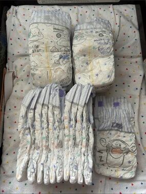 Huggies overnights Size 6 Baby Diapers - Winnie the pooh print.